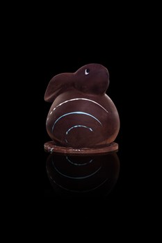 Rabbit ball - Green : Milk chocolate - Blue : dark chocolate, garnished with chocolate almonds and hazelnuts, chocolates, nougatine eggs, small 160 gr 22.- or big 330 gr 42.- (with choconougat, little bars)