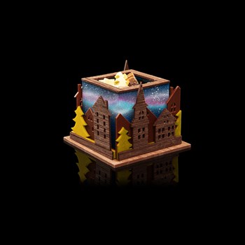 Christmas village  - Dark and milk chocolate, coated almonds and hazelnuts, pralines, choconougat and various small chocolates. 430g 59.- 
