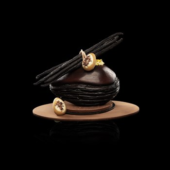 Oeuf: noir vanille  - Chocolat noir, amandes, noisettes, oeufs pralinés et fritures 360g 62.-