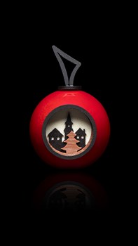 La boule rouge - Chocolat Noir et blanc, amandes et noisettes enrobées et divers petits chocolats. 114g 22.-