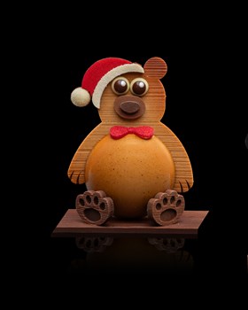 Le nounours - Chocolat Noir Lait et blanc, amandes et noisettes enrobées et divers petits chocolats. 186g 28.-