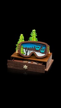 Le masque de Ski - Chocolat Noir Lait et blanc, amandes et noisettes enrobées et divers petits chocolats. 540g 75.-